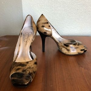 Leopard patent pumps